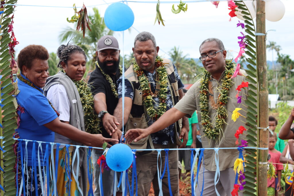 Official Ribbon cutting of the Solar PV Hybrid System for Hunanawa, L to R Ms Vini Talai - UNDP, SPIRES PM Judith Reynolds, MECDM Barnabas Bago, MMERE P.S Dr. Chris Vehe and Hon MP for East Are'Are Junior P Kenilorea